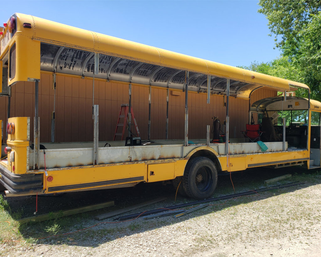 After clearing out the inside of the bus, we raised the roof…20 inches. Removing windows and cutting our bus in half, essentially, was a bit of work, but as we cranked the ceiling away from the base of the bus, we began to envision all the extra space it will give to us while we travel.